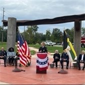 Belleville 2023 9/11 Ceremony. Fire Chief, Stephanie Mills, speaking to a crowd.