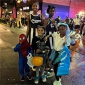 Main Street Trick or Treat in Downtown Belleville, group of children in Halloween costumes trick or treating