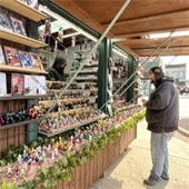 Shopper looks at wares during Belleville's 10th annual Christkindlmarkt