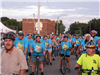 Group of bike riders in blue t-shirts
