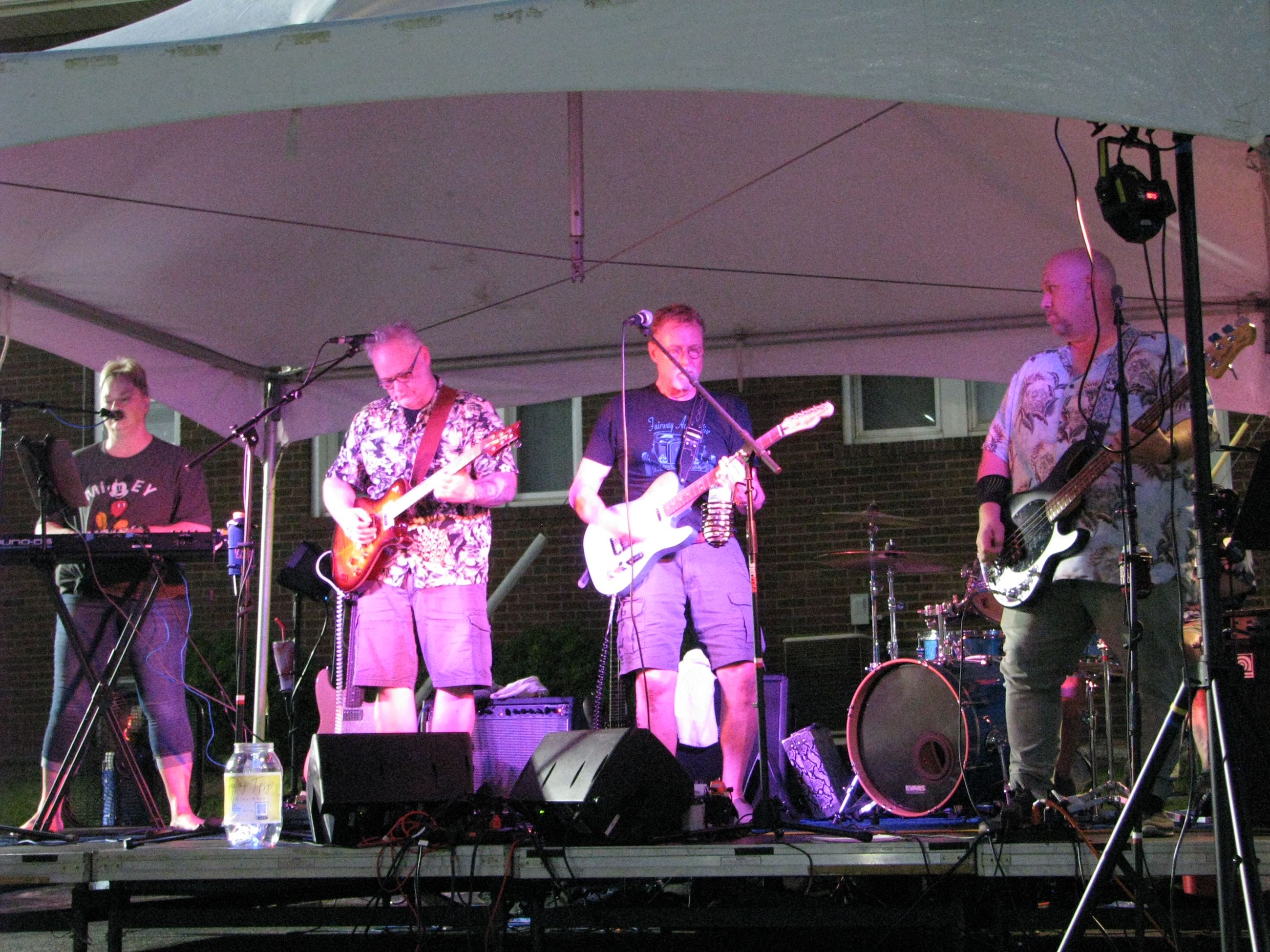 Band on stage at Tour de Belleville