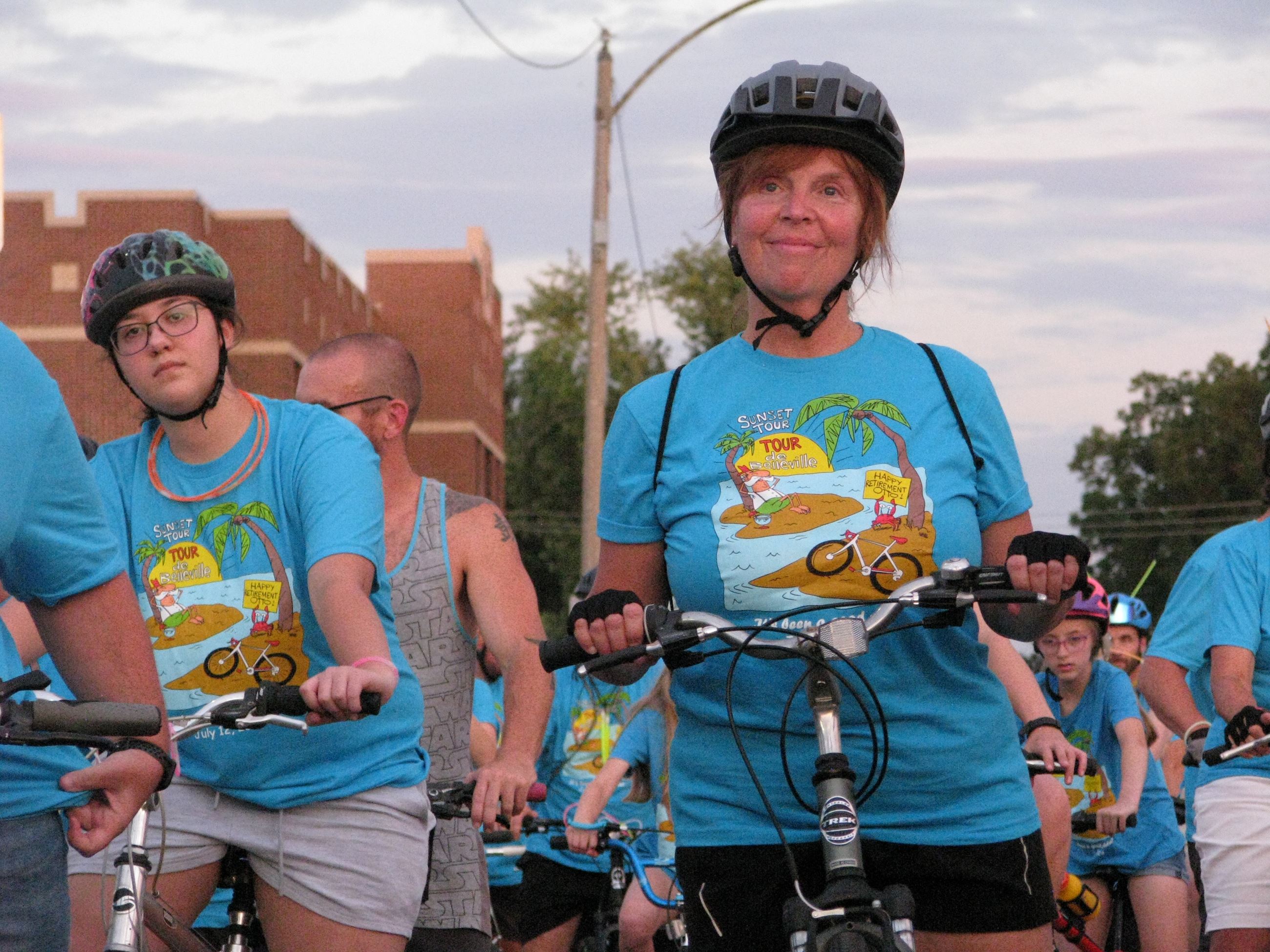 Happy bike rider in blue t-shirt